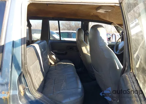 1999 Jeep Cherokee Classic/Sport z USA, uszkodzony, nr VIN 1J4FF68S4XL548622